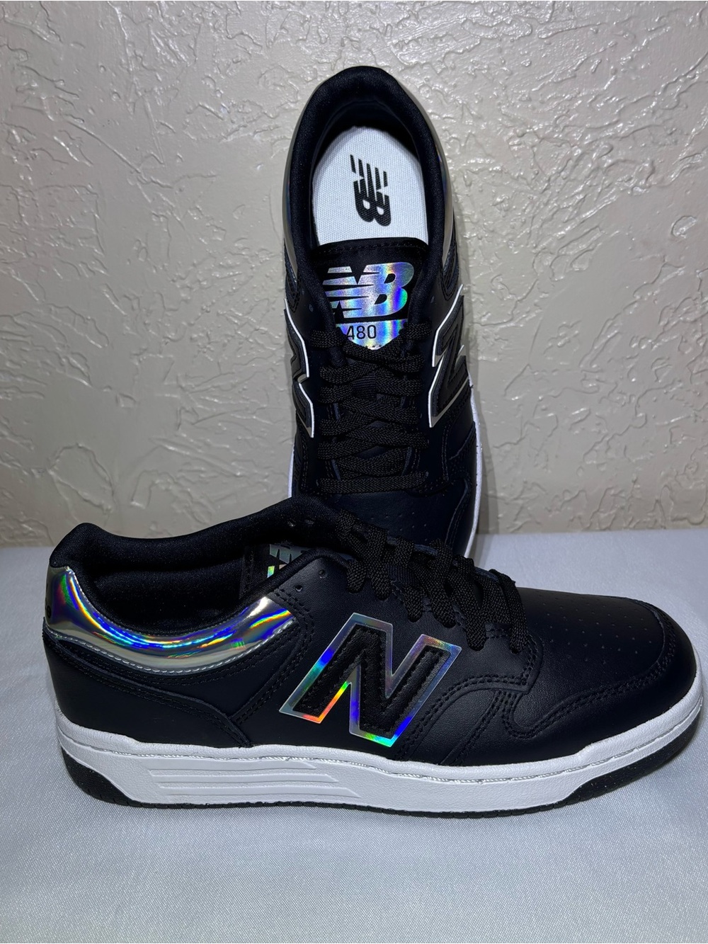 New Balance Men’s Black Sneakers with Holographic Accents